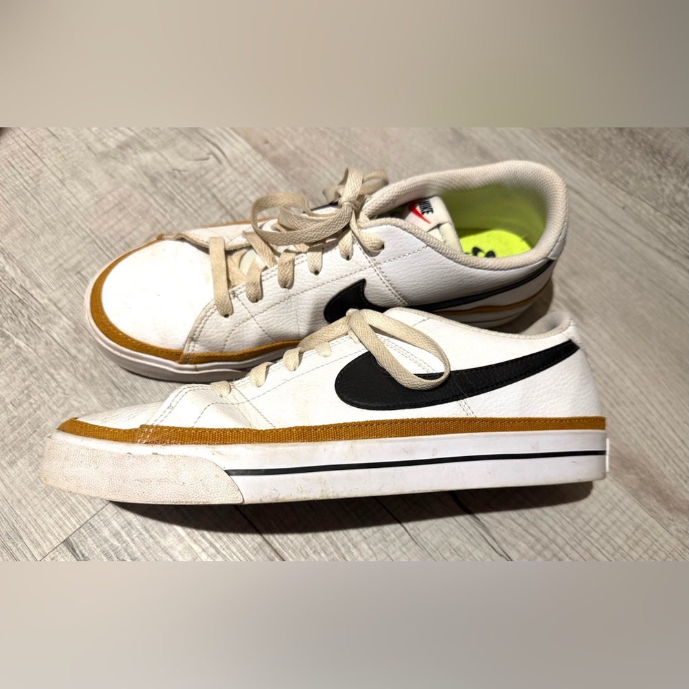 Nike Women's White Leather Low-Top Sneakers with Black Swoosh and Brown Accent